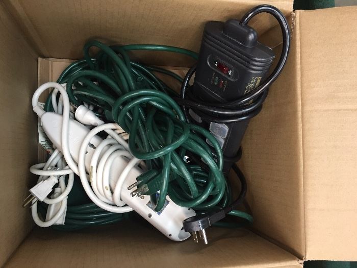 Box lot extension cords and surge bars