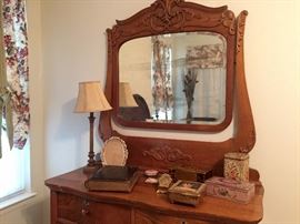 Dresser with mirror and vintage tins