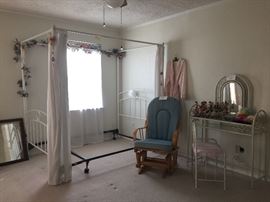 Bed frame and glass-top vanity 