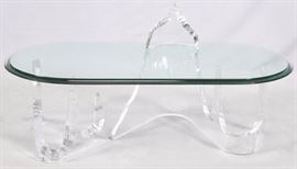 Lot#6, "LION IN FROST" ICEBERG, GLASS COFFEE TABLE, 4 PIECES H 16", W 26", L 54"Signed on Glass. "Lion in Frost" Iceberg, glass coffee table having an oval top glass, two base pieces, and icicle (H 8 1/2").