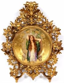 Lot#56, MEISEL, GERMAN HAND PAINTED PORCELAIN PLATE, DIA 9.5"', PORTRAIT OF A FEMALE. Depicting a semi-nude standing female. Signed Meisel lower right.  In a pierced gilt wood frame. Marked on verso.