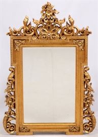 Lot#210, BAROQUE STYLE WOOD HALL MIRROR, H 60", W 41.75" Having a gilt finish, flower and leaf designs and a .75" bevel glass.