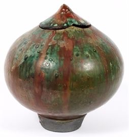 Lot#318, GLAZED POTTERY JAR, 20TH C, H 10", DIA 9" Having drizzle paint design, bulbous body narrowing down to a small diameter base and a fitted lid. Unsigned.