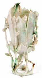 Lot#1116, BURMESE CARVED JADEITE VASE, CIRCA 1920, H 9.25", DIA 3.5" A beautifully carved jadeite vine and flower form vase.  Primarily celadon in color having carved flower petals with dragonfly and flower buds.
