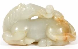 Lot#1123, CARVED JADE HORSE AND MONKEY, H 2.25", L 3.75" Depicting a recumbent horse with a monkey seated on the horse.