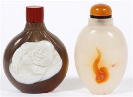 Lot#1125, CHINESE SNUFF BOTTLES, TWO, H 2 1/4" AND 2 1/8". The brown signed snuff bottle features a laughing Buddha with the agate snuff bottle depicts a cloud.