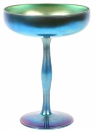 Lot#1176, STEUBEN BLUE AURENE GLASS COMPOTE, H 7 7/8"A Steuben blue aurene glass compote marked on the underside of the base "Steuben Aurene 2642".