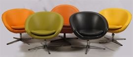 Lot#1181, SWEDISH MID-CENTURY MODERN CLUB CHAIRS, FIVE. Including four Overman, Model M 24, swivel chairs one each green, orange, yellow and black.  Accompanied by a similar chair, orange in color.