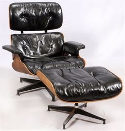 Lot#1180, HERMAN MILLER EAMES, LEATHER MAHOGANY ARM CHAIR & OTTOMAN. Label on chair.