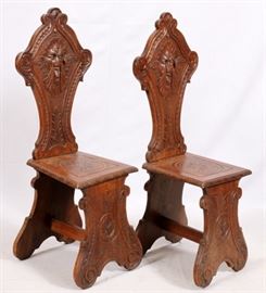 Lot#1270, ITALIAN CARVED WOOD HALL CHAIRS, PAIR, H 46"Having carved masks in the back splat and overall carving on the seats and legs.