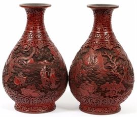 Lot#1271, CHINESE CINNABAR LACQUER VASES, 19TH CENTURY, PAIR, H 11 1/2"An opposing pair of vases; pear form with a flared rim and neck of lotus strapwork, continuous scene of figural groups, probably the Eight Immortals, in boats and floating amongst riverscapes and rocky outcroppings; enclosed below by a key and ruyi border.  Measures H.11 1/2", Dia.7 1/4", approximately. From the collection of Mrs. G. G. Scranton, international traveler from the late 1800's to the mid twentieth century. Friend and patron of Mrs. Dagny Carter, a notable scholar, influenced this collection.