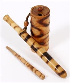 Lot#1387, JAPANESE WOOD PIPE CASE (KISERU) AND TOBACCO BOX (TONKOTSU), L 6 1/2"A lidded bamboo tobacco box (tonkotsu), H.4 1/4", with a pipe and pipe case (kiseru). From the collection of Mrs. G. G. Scranton, international traveler from the late 1800's to the mid twentieth century. Friend and patron of Mrs. Dagny Carter, a notable scholar, influenced this collection.