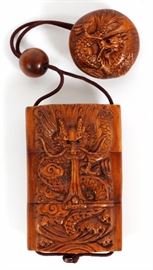 Lot#1389, JAPANESE SIGNED CARVED INRO WITH NETSUKE. The three compartment signed inro is H 2.5" and features a rabbits and the netsuke depicts a rabbit..