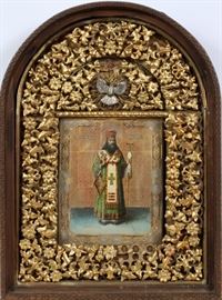 Lot#2032, RUSSIAN ICON, 19TH.C. H 38", W 28", D 5 1/2" Oak shadow box, patriarch painted on panel 16" x 14". Gold leaf foliage surrounds panel. From a prominent Bloomfield Hills collector.