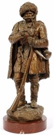 Lot#2121, LEONID POSEN (RUSSIAN, 1849-1921) BRONZE SCULPTURE, H 18 1/2", CAUCASIAN WARRIOR LIGHTING HIS PIPE. Measurement does not include the red marble base; signed in Cyrillic; no foundry mark.