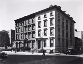 Lot#2210, BERNICE ABBOTT (AMERICAN, 1898-1991), PHOTOGRAPH, H 10 1/2", W 13 1/2", "5TH AVENUE ROW HOUSES" Negative is 1936, date that this was printed is unknown; pencil signed, no edition number; verso stamped Commerce Graphics, LTD, East Rutherford, NJ and marked in pencil #16; matted.