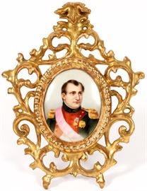 Lot#2292, HAND PAINTED PORCELAIN PLAQUE, H 3.5", W 2.75", PORTRAIT OF NAPOLEON. Unsigned.  Encased in a gilt wood easel.