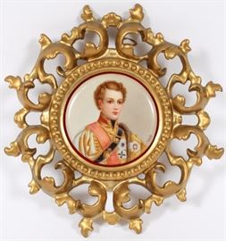 Lot#2298, ULLRICH HAND PAINTED PORCELAIN PLAQUE, DIA 3 5/8", PORTRAIT OF A YOUNG OFFICER. A portrait of a young military officer with medals.  Signed.  In a gilt wood frame.
