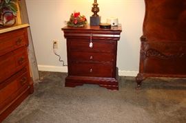 Two matching nightstands available.