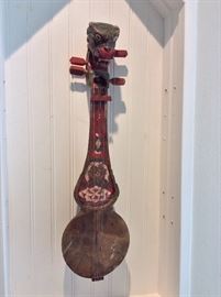 Tibetan Dragon 4-string musical instrument. 20" length. 