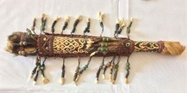 Tribal Spear and Sheath with animal pelt, teeth, and stone bead decoration.