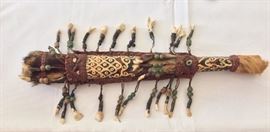 Tribal Spear and Sheath with animal pelt, teeth, and stone bead decoration.
