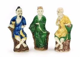 SET OF THREE GLAZED FIGURES
