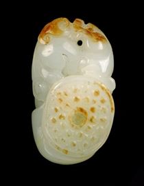 CARVED JADE QILING ON COIN
