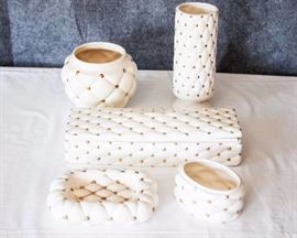 Shop Vanity Set	Five Piece Hand Made Kathy's Hobby Shop Vanity Set: Two vases 3" diameter x 8.5"H, 4" diameter x 5"H, covered box 12"W x , 4"D x 2" H, soap dish 6.5"W x 1.5"D, dish 3.75" diameter x 2.25"H. Tall vase has fine crack, small dish has fine hairline crack