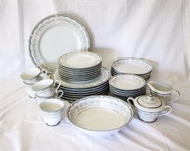 Seizan Lakeside Japanese Fine China Set: seven dishes, eight salad plates, six soup bowls, nine saucers, five cups, 12" platter, 9" serving bowl, cream and sugar. Some pieces have minor chips, but enough is included to make a complete four piece setting.