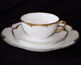 Sixteen Piece Haviland Limoges Gold Rimmed Dessert China Set: Six dessert plates, five cups & saucers. Some pieces have small chips, but enough to make a four piece set.