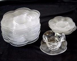 Nineteen Piece Glassware Set: Twelve 8" luncheon plates, five 6" dessert plates, one 4" W x 3" H serving dish w/ saucer