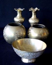 Five Piece Brass Collection: Made in India. Two 2" W x 6" H fluted vases, two 4" W x 3.5" H vases, 5" W x 3" H bowl