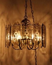 Hanging Lamp: Brass with 12 beveled glass inserts. Good condition commensurate with age, tarnish on brass. 15" W x 12" H