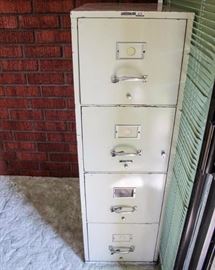 Underwriters' Laboratories, Inc. Insulated Four Drawer Filing Cabinet: Classification D No. 786143. Paint chipped throughout. 17" W x 30" D x 54" H