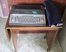Cannon S-68s Word Processor & Cart: Includes cover and features an enhanced 9,000 word spelling checker. 17.5" W x 15" D