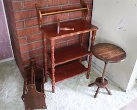 Five Pieces of Assorted Wood Furniture: Terrific for shabby chic project! Three shelf unit measures 23" W x 11.5" D x 29.5" H, and has water mark on top and split in one leg. Magazine rack measures 17" W x 9.5" D x 15" H, and has some dings and scratches. Plate shelf measures 22.25" L x 4" D x 10" H, and has some dings and scratches. Half circle wall mounted shelf measures 9" W x 4" D x 7" H, and is in good condition. Round plant stand measures 14" W x 22.5" H, and is well worn. 