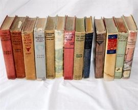 Thirteen Zane Grey Hardcover Novels: The American author was an action-adventure novelist that is best known for his association with the Western genre. Several of his novels and short stories have been adapted for film and television. The novels in this lot include: Wildfire (1916); The Man of the Forest (1920); Code of the West (1934); Knights of the Range (1936); The Vanishing American; The Heritage of the Desert (1910); Western Union (1939); The Thundering Herd; The Spirit of the Border (1906); Wanderer of the Wasteland (1923); The Last of the Plainsmen; The Light of Western Stars; Riders of the Purple Sage. Titles with dates included are first edition publications. The books in this lot are in fair to poor condition.