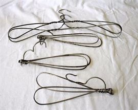 Five Vintage Metal Clothes Hangers: Two fixed twisted metal hangers, two collapsible metal hangers with double hinge, one collapsible twisted metal hanger with single hinge.