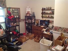 Holiday decor, Hummel Nativity set, Hallmark ornaments in box, office supplies.