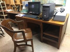 Oak desk, oak chair, computer parts.