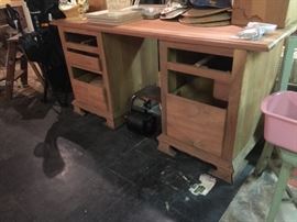 Unfinished walnut roll top desk base.
