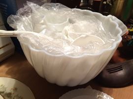 Unusual milk glass punch bowl and cups.