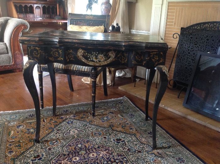 Antique papier-mâché card/game table table featuring mother of pearl and gorgeous hand painted flowers with gold accents.