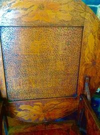 Close up of Pyrography chair/table ... polychrome details.