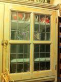 Butler's Pantry 8'x56x20 with leaded glass panes and original hardware.