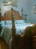 Four poster queen bed