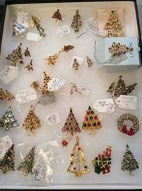 4 Trays of vintage christmas tree's pins. 