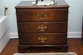 Pair of side tables with three drawers.  The back of the tables are finished as finely as the rest of the piece!