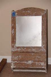Antique mirrored medicine cabinet with one draw and additional storage.  Very shabby chic!
